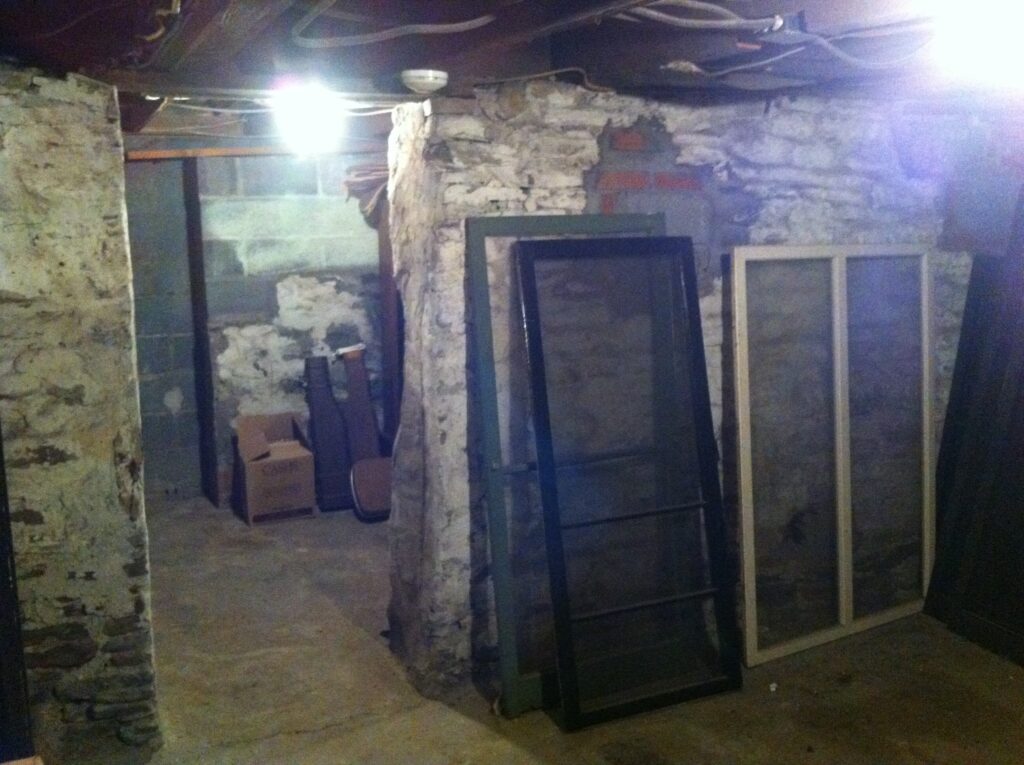 Existing Dalton fieldstone basement before the wine cellar renovation